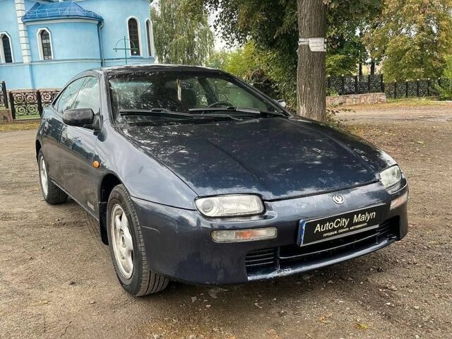 Синій Мазда 323, об'ємом двигуна 1.5 л та пробігом 253 тис. км за 2700 $, фото 1 на Automoto.ua