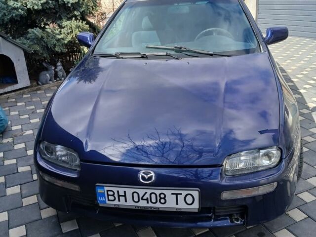 Синій Мазда 323, об'ємом двигуна 1.5 л та пробігом 260 тис. км за 2500 $, фото 1 на Automoto.ua