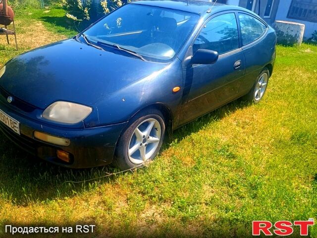 Синій Мазда 323, об'ємом двигуна 1.3 л та пробігом 0 тис. км за 1700 $, фото 1 на Automoto.ua