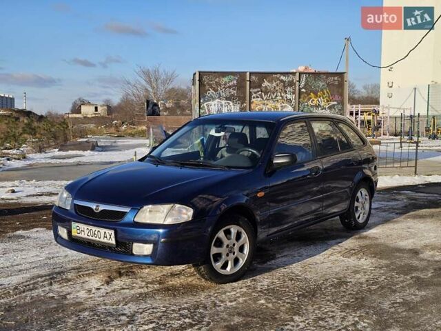 Синий Мазда 323, объемом двигателя 1.5 л и пробегом 200 тыс. км за 3250 $, фото 1 на Automoto.ua