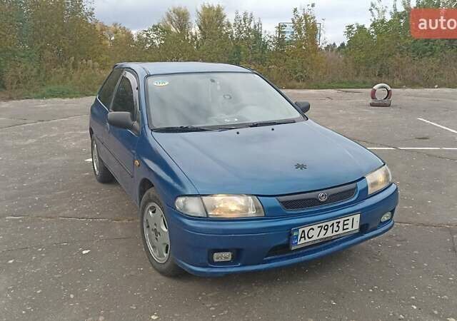 Синий Мазда 323, объемом двигателя 1.32 л и пробегом 235 тыс. км за 2650 $, фото 1 на Automoto.ua