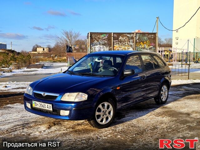 Синий Мазда 323, объемом двигателя 1.5 л и пробегом 200 тыс. км за 3250 $, фото 1 на Automoto.ua