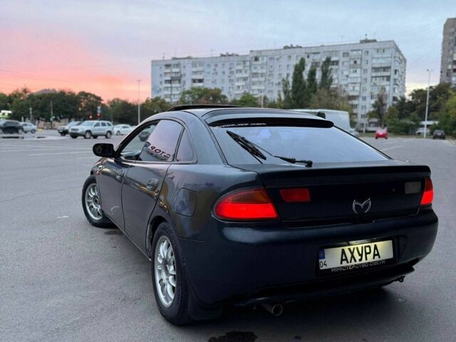 Синій Мазда 323, об'ємом двигуна 1.5 л та пробігом 370 тис. км за 2709 $, фото 1 на Automoto.ua