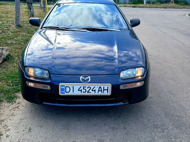 Синий Мазда 323, объемом двигателя 1.5 л и пробегом 370 тыс. км за 2200 $, фото 1 на Automoto.ua