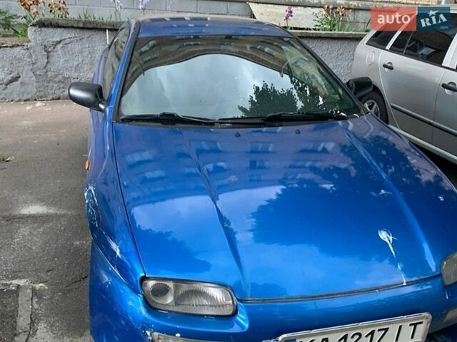 Синий Мазда 323, объемом двигателя 1.49 л и пробегом 390 тыс. км за 1200 $, фото 1 на Automoto.ua