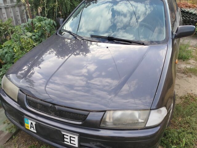 Синий Мазда 323, объемом двигателя 0 л и пробегом 300 тыс. км за 1241 $, фото 1 на Automoto.ua