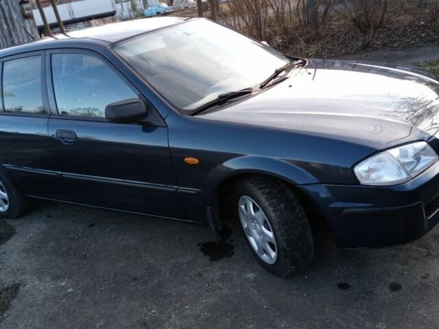 Синій Мазда 323, об'ємом двигуна 1.3 л та пробігом 270 тис. км за 1700 $, фото 1 на Automoto.ua