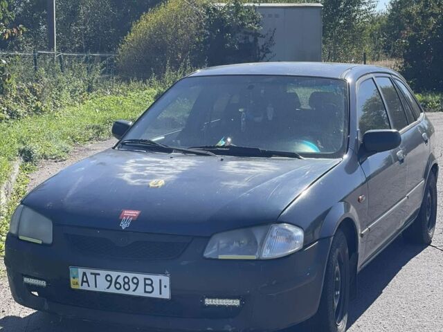 Синий Мазда 323, объемом двигателя 2 л и пробегом 240 тыс. км за 2500 $, фото 1 на Automoto.ua