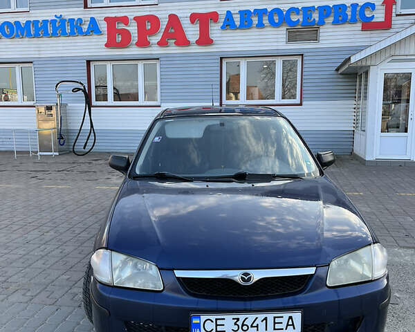 Синий Мазда 323, объемом двигателя 2 л и пробегом 380 тыс. км за 2800 $, фото 1 на Automoto.ua