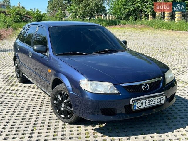 Синий Мазда 323, объемом двигателя 2 л и пробегом 288 тыс. км за 2500 $, фото 1 на Automoto.ua