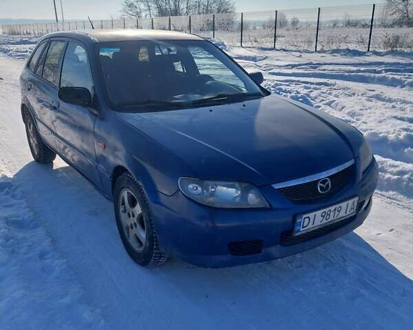 Синий Мазда 323, объемом двигателя 1.32 л и пробегом 250 тыс. км за 1700 $, фото 1 на Automoto.ua