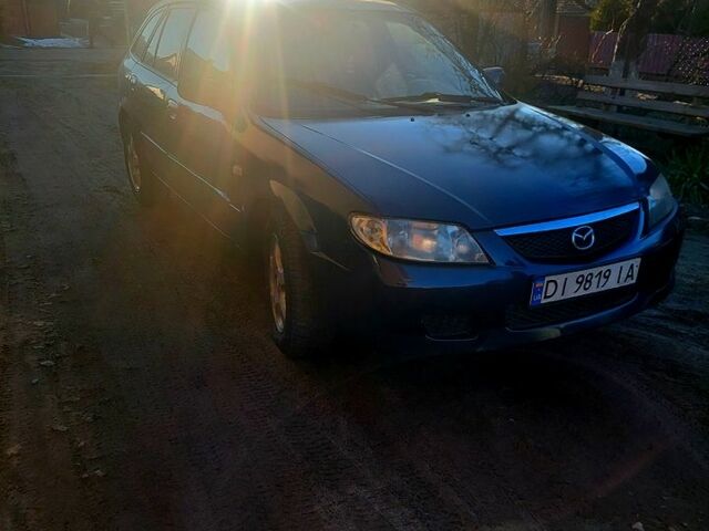 Синий Мазда 323, объемом двигателя 1.3 л и пробегом 250 тыс. км за 1600 $, фото 1 на Automoto.ua