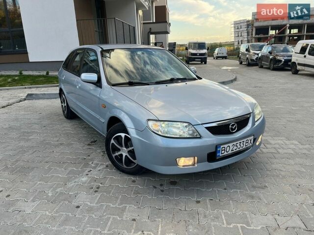 Синій Мазда 323, об'ємом двигуна 1.6 л та пробігом 250 тис. км за 2399 $, фото 1 на Automoto.ua