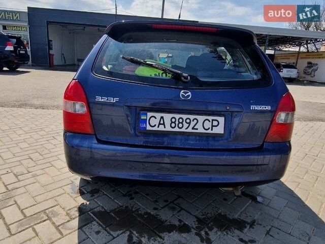 Синий Мазда 323, объемом двигателя 1.99 л и пробегом 288 тыс. км за 2600 $, фото 1 на Automoto.ua