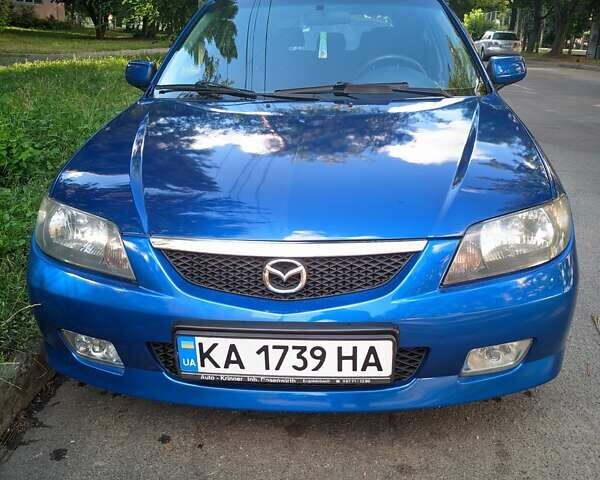 Синий Мазда 323, объемом двигателя 1.6 л и пробегом 407 тыс. км за 3200 $, фото 1 на Automoto.ua