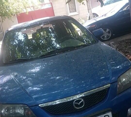 Синий Мазда 323, объемом двигателя 1.6 л и пробегом 25 тыс. км за 1100 $, фото 1 на Automoto.ua