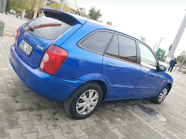 Синий Мазда 323, объемом двигателя 2 л и пробегом 270 тыс. км за 1350 $, фото 1 на Automoto.ua
