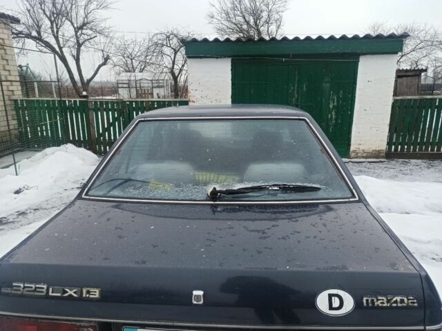 Синий Мазда 323, объемом двигателя 0 л и пробегом 228 тыс. км за 1500 $, фото 1 на Automoto.ua