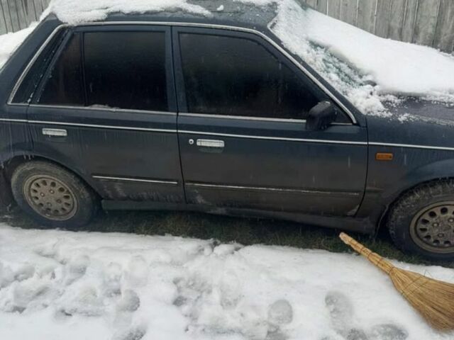 Синий Мазда 323, объемом двигателя 3.9 л и пробегом 3 тыс. км за 1900 $, фото 1 на Automoto.ua