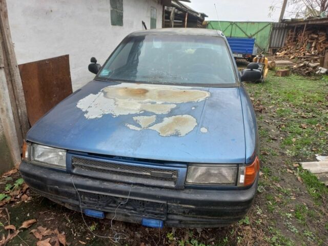 Синий Мазда 323, объемом двигателя 1.3 л и пробегом 240 тыс. км за 400 $, фото 1 на Automoto.ua