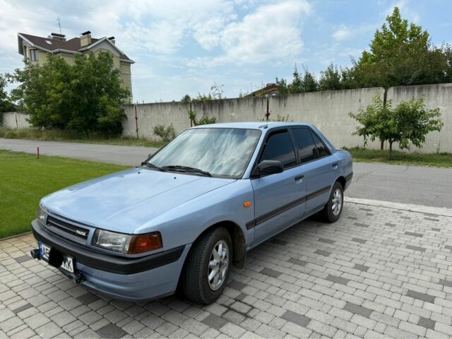 Синий Мазда 323, объемом двигателя 1.4 л и пробегом 217 тыс. км за 3026 $, фото 1 на Automoto.ua