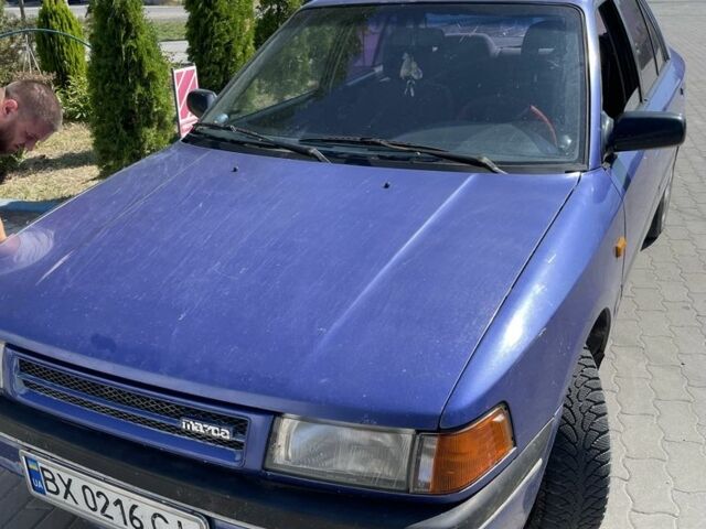 Синій Мазда 323, об'ємом двигуна 1.6 л та пробігом 250 тис. км за 602 $, фото 1 на Automoto.ua