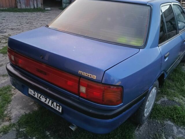 Синій Мазда 323, об'ємом двигуна 1.6 л та пробігом 340 тис. км за 1700 $, фото 1 на Automoto.ua