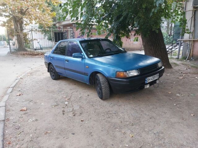 Синий Мазда 323, объемом двигателя 1.7 л и пробегом 2 тыс. км за 1204 $, фото 1 на Automoto.ua