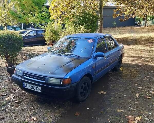 Синий Мазда 323, объемом двигателя 1.7 л и пробегом 350 тыс. км за 850 $, фото 1 на Automoto.ua