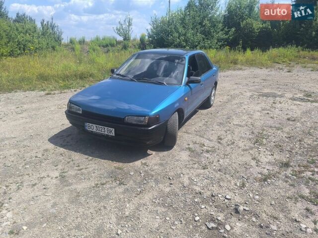 Синий Мазда 323, объемом двигателя 1.69 л и пробегом 300 тыс. км за 1300 $, фото 1 на Automoto.ua