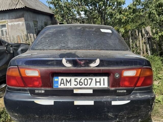 Синий Мазда 323, объемом двигателя 1.5 л и пробегом 247 тыс. км за 402 $, фото 1 на Automoto.ua