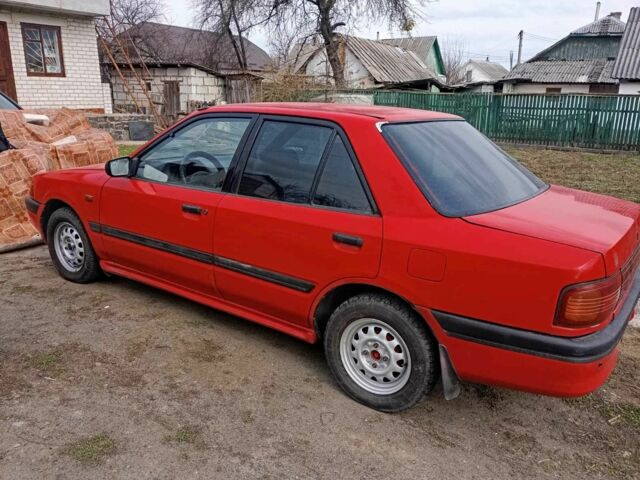 Синий Мазда 323, объемом двигателя 2.2 л и пробегом 250 тыс. км за 1100 $, фото 1 на Automoto.ua