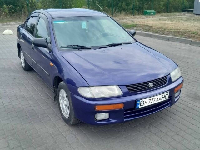 Синий Мазда 323, объемом двигателя 1.5 л и пробегом 316 тыс. км за 2199 $, фото 1 на Automoto.ua