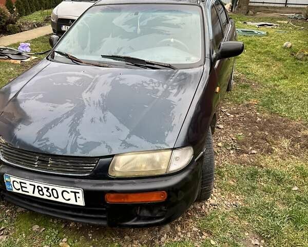 Синий Мазда 323, объемом двигателя 1.3 л и пробегом 300 тыс. км за 1300 $, фото 1 на Automoto.ua