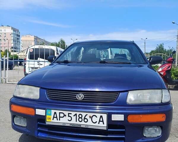 Синий Мазда 323, объемом двигателя 1.5 л и пробегом 295 тыс. км за 2300 $, фото 1 на Automoto.ua