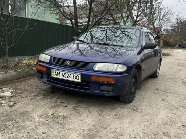 Синій Мазда 323, об'ємом двигуна 1.5 л та пробігом 500 тис. км за 1375 $, фото 1 на Automoto.ua