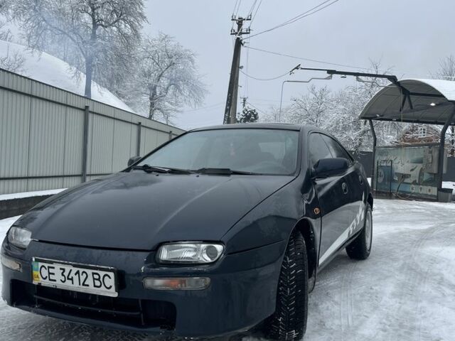 Синий Мазда 323, объемом двигателя 1.8 л и пробегом 307 тыс. км за 2200 $, фото 1 на Automoto.ua