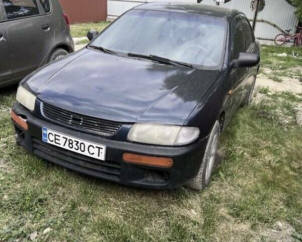 Синий Мазда 323, объемом двигателя 1.3 л и пробегом 300 тыс. км за 2300 $, фото 1 на Automoto.ua