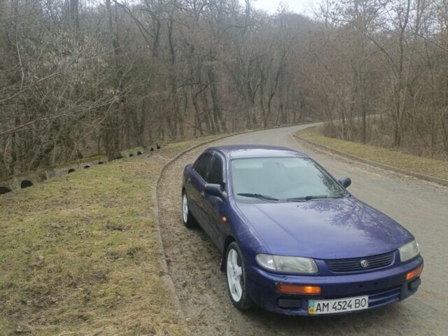 Синий Мазда 323, объемом двигателя 1.5 л и пробегом 670 тыс. км за 1500 $, фото 1 на Automoto.ua