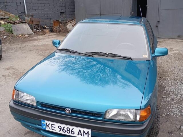 Синий Мазда 323, объемом двигателя 1.6 л и пробегом 160 тыс. км за 3000 $, фото 1 на Automoto.ua