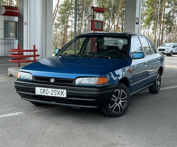 Синий Мазда 323, объемом двигателя 1.6 л и пробегом 250 тыс. км за 1900 $, фото 1 на Automoto.ua