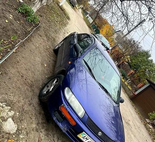 Синий Мазда 323, объемом двигателя 1.5 л и пробегом 500 тыс. км за 999 $, фото 1 на Automoto.ua