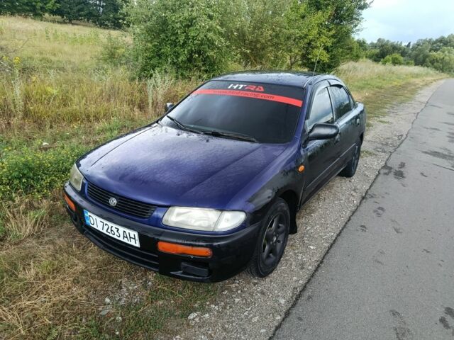 Синій Мазда 323, об'ємом двигуна 0 л та пробігом 200 тис. км за 850 $, фото 1 на Automoto.ua