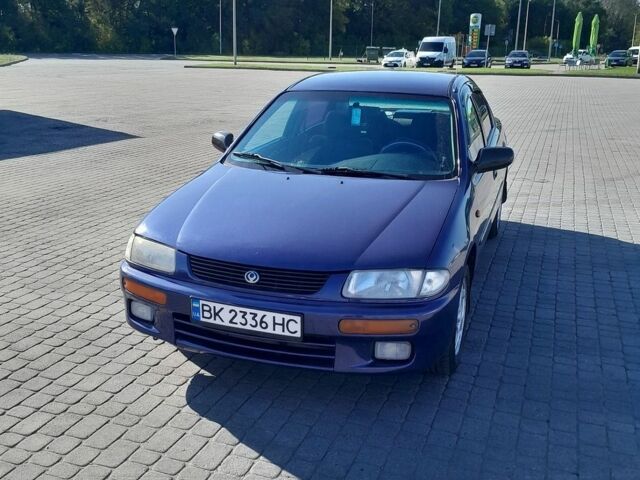 Синий Мазда 323, объемом двигателя 1.5 л и пробегом 290 тыс. км за 1999 $, фото 1 на Automoto.ua