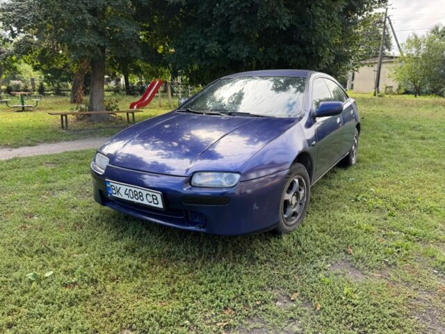 Синій Мазда 323, об'ємом двигуна 1.5 л та пробігом 340 тис. км за 1200 $, фото 1 на Automoto.ua