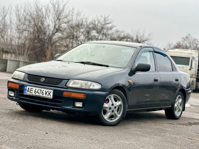 Синий Мазда 323, объемом двигателя 1.5 л и пробегом 399 тыс. км за 1550 $, фото 1 на Automoto.ua
