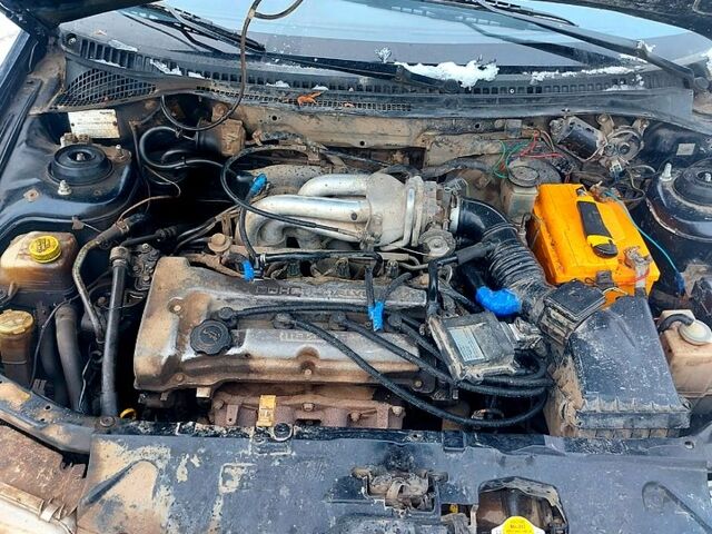 Синий Мазда 323, объемом двигателя 1.5 л и пробегом 230 тыс. км за 420 $, фото 1 на Automoto.ua