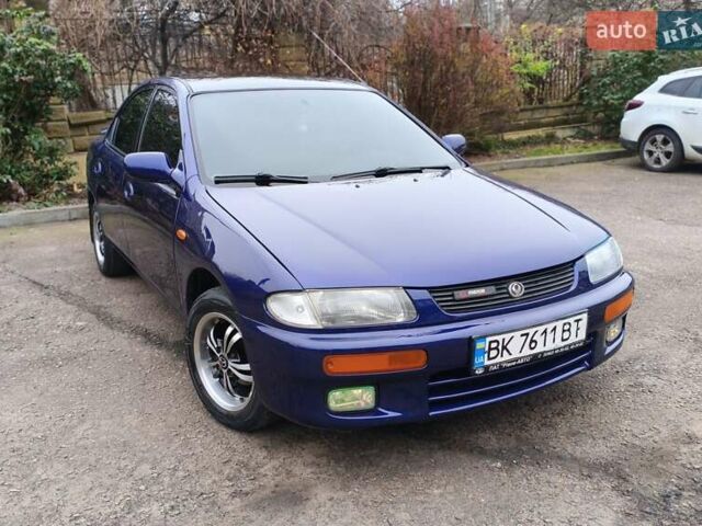 Синий Мазда 323, объемом двигателя 1.5 л и пробегом 342 тыс. км за 2600 $, фото 1 на Automoto.ua