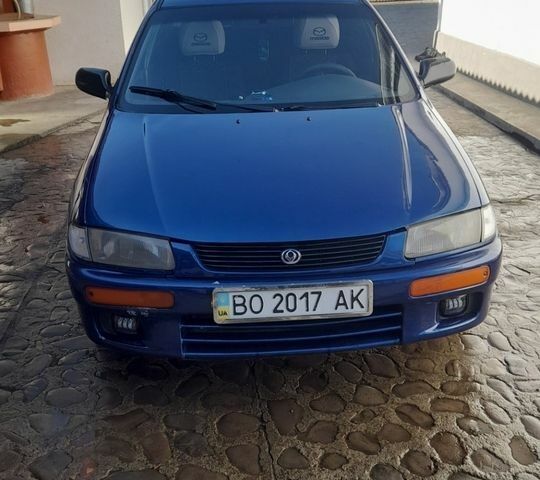 Синій Мазда 323, об'ємом двигуна 1.5 л та пробігом 466 тис. км за 1600 $, фото 1 на Automoto.ua