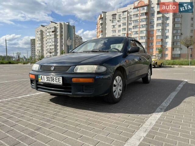 Синій Мазда 323, об'ємом двигуна 1.5 л та пробігом 471 тис. км за 2500 $, фото 1 на Automoto.ua